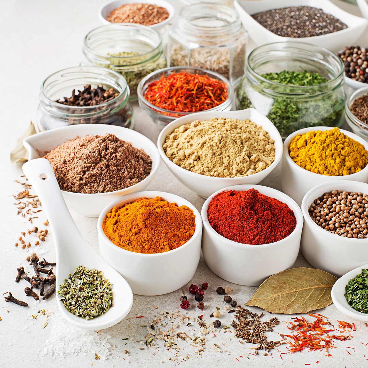 An assortment of herbs in bowls used for nutritional supplements