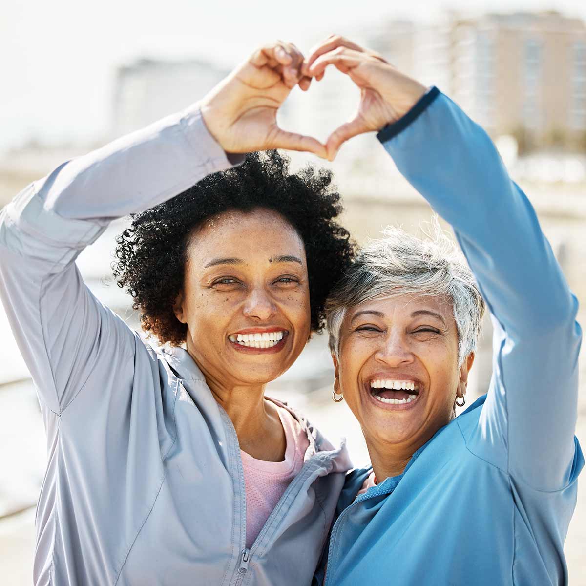 Woman and her mother working out together