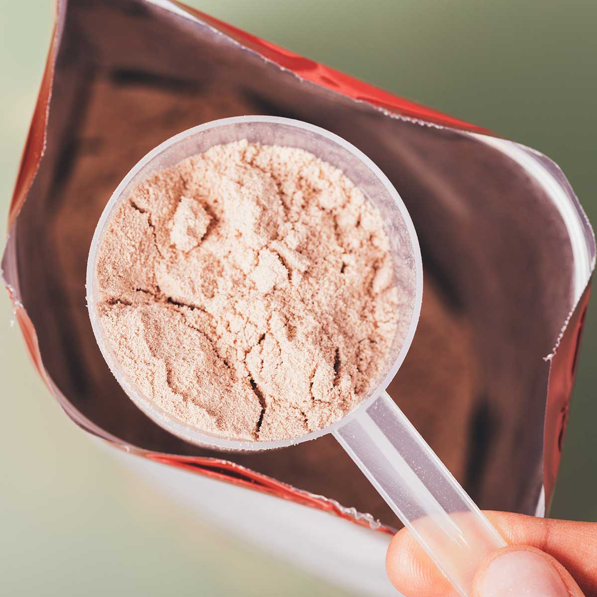 scoop of powder and a pouch