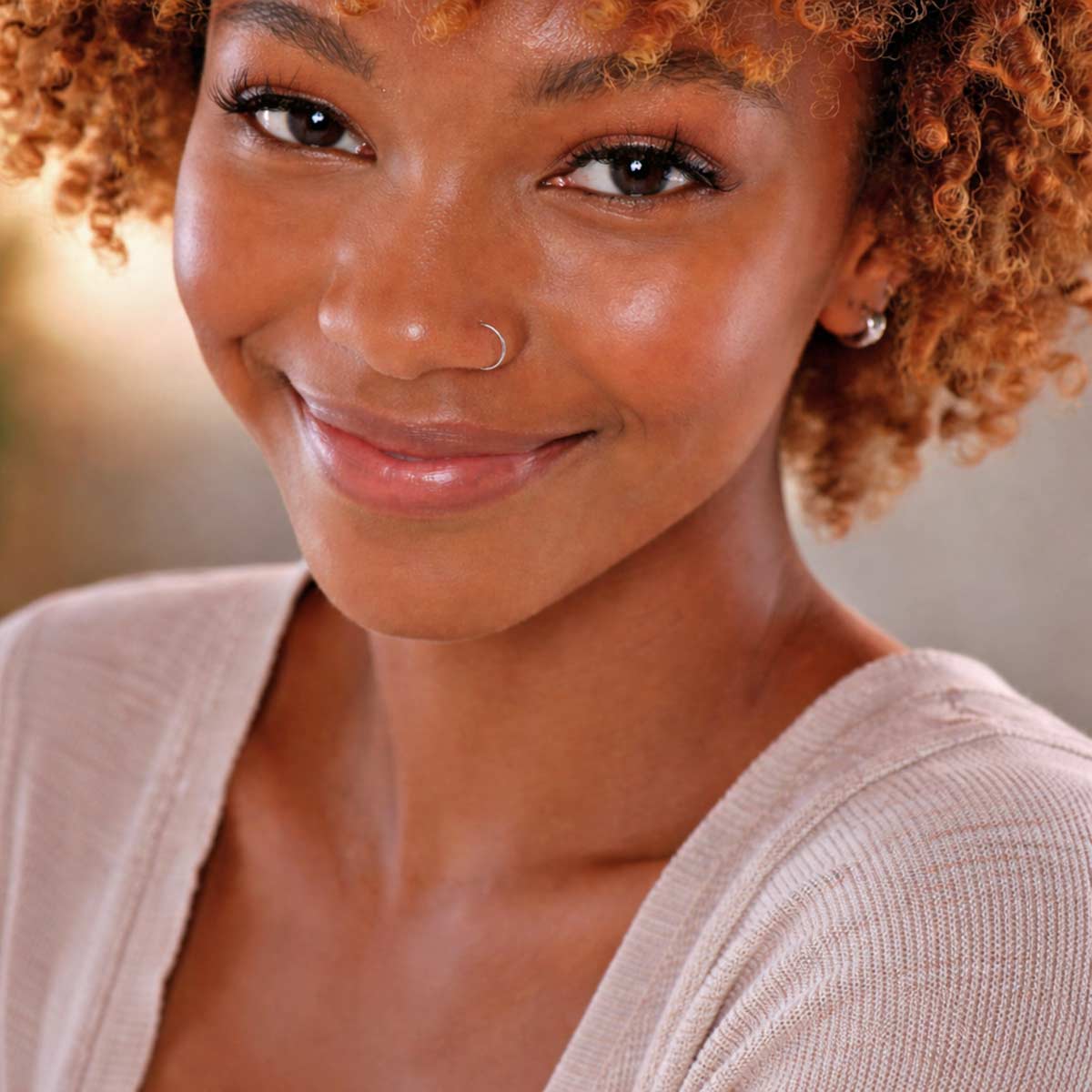 beautiful young woman with bright glowing skin