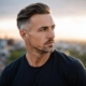 man looking off into the sunset