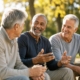 three older men hangoing out in the park together