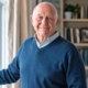 older man smiling happily at the camera